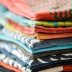 Stack of folded patterned t-shirts