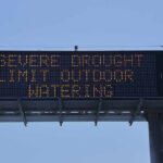 digital highway sign warning about severe drought