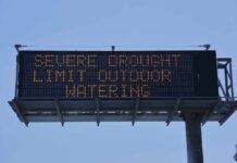 digital highway sign warning about severe drought
