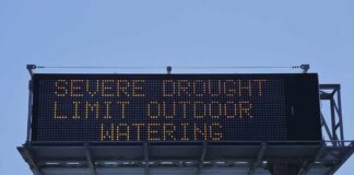 digital highway sign warning about severe drought