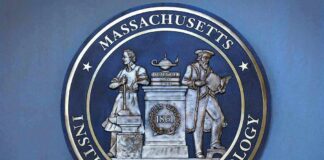 MIT seal with classical figures and motto