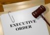 Trump Seizes NIH – Women’s Health Overhaul A gavel resting on a document labeled 'EXECUTIVE ORDER'