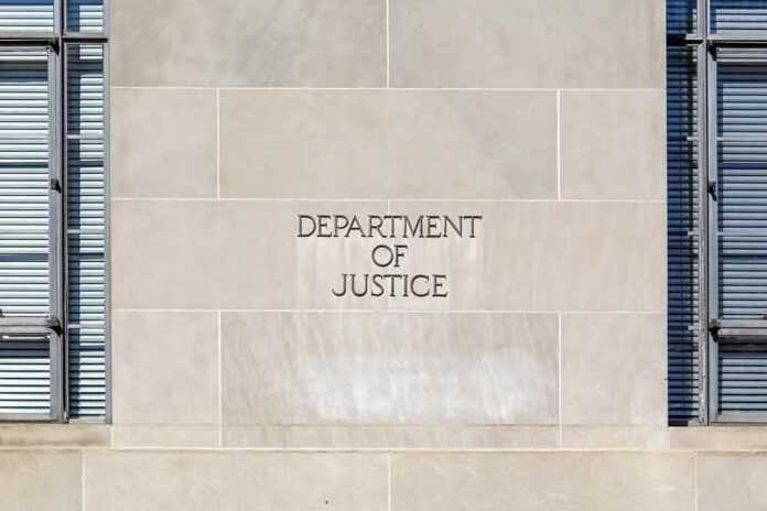 Department of Justice building facade with engraved sign