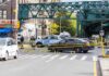 Horrifying Lie Unravels After 9-Year-Old Dies Police cars block a city intersection with yellow crime scene tape