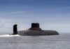 Submarine cruising on calm sea