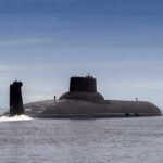 Defense Shake-Up: New Mega Shipyard Submarine cruising on calm sea