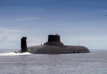 Submarine cruising on calm sea