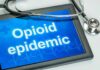 Tablet with stethoscope highlighting opioid epidemic