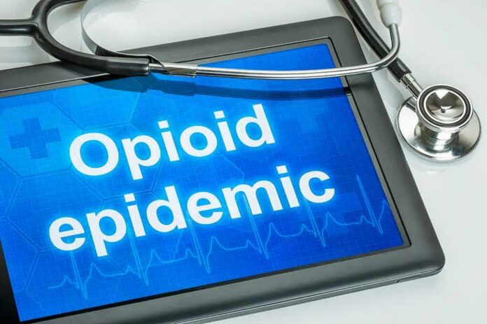 Tablet with stethoscope highlighting opioid epidemic